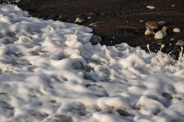 Sea wave close-up. Sea foam. Water spray