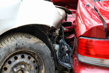 Car accident in the street. Smashed auto after car collision