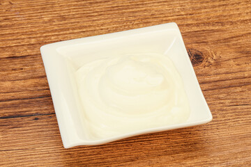 Sour cream in the bowl