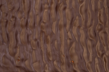 Macro photo of a sweet, delicious bar of chocolate photo taken from above