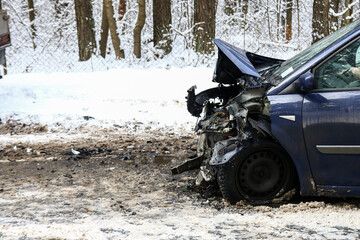 Car accident in the street. Smashed auto after car collision