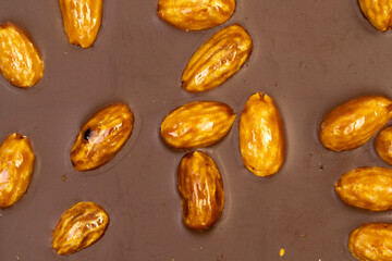 Macro photo of a sweet, delicious bar of chocolate photo taken from above