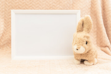 Stuffed animal toy bunny and white frame mockup