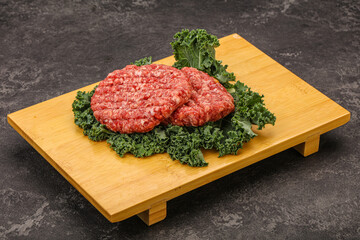 Raw beef burger cutlet for cooking