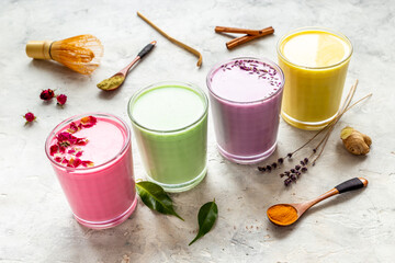 Colorful latte coffee or tea - with blue spirulina turmeric and matcha