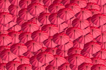 Fototapeta na wymiar tanti ombrelli rossi aperti