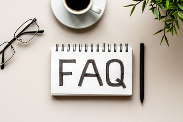 FAQ concept. Text on office table. Information Helpdesk