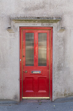 Old Red Door In A Wall