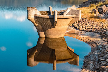 Beautiful autumn or indian summer view with reflections at the famous drinking water reservoir Frauenau, Bavarian forest, Bavaria, Germany