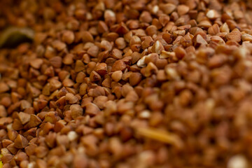 buckwheat closeup background. dry buckwheat texture The concept of diet and healthy eating