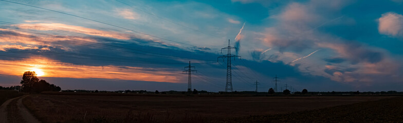 High resolution stitched panorama of a beautiful autumn or indian summer sunset near Tabertshausen, Bavaria, Germany