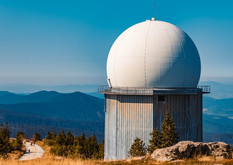 Fototapeta premium Beautiful autumn or indian summer view with the famous domed structure at the Grosser Arber summit, Bayerisch Eisenstein, Bavarian forest, Bavaria, Germany