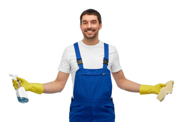 profession, cleaning service and people concept - happy smiling male worker or cleaner in overall...