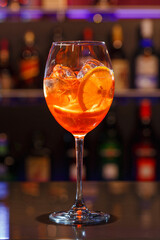 Orange coctail on the bar stand
