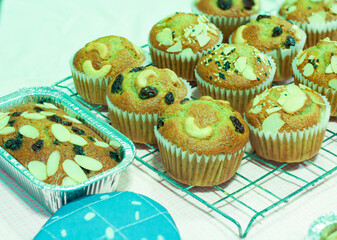 Selective focus bread, cupcakes, baked bananas decorated with nuts, walnuts, nutritious as breakfast or homemade desserts, bakery, healthy food.
