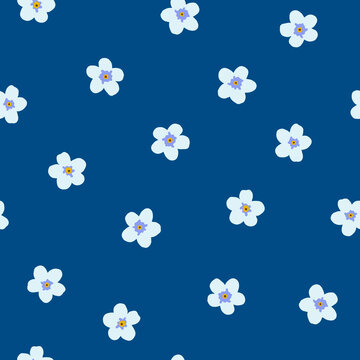Forget-me-not light blue flowers seamless pattern on blue background