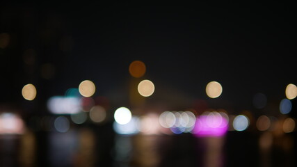 Blurred bokeh city  waterfront at night, bokeh abstract background
