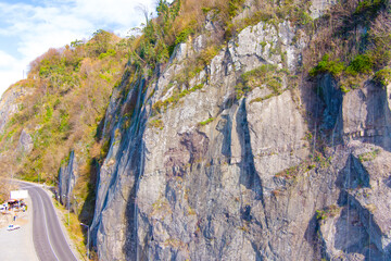 High canyon above the road by the sea