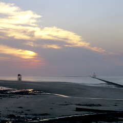 Beautiful view of Normandy beach at sunset in Calvados department, Normandy, France