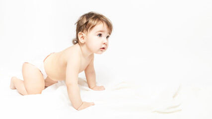 Funny crawling baby wearing a diaper