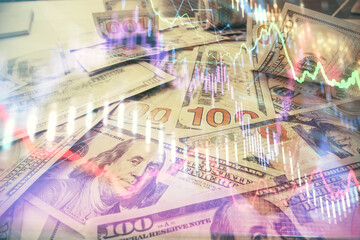 Multi exposure of forex chart drawing over us dollars bill background. Concept of financial success markets.