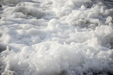 Sea wave close-up. Sea foam.