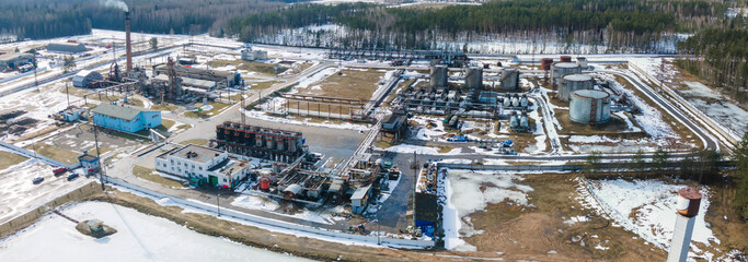 Panoramic view of street asphalt factory company. Industry bitumen storage from above. Production of bitumen. Petrochemical industry concept.