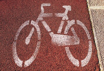 Painted symbol of a bike in the street, concept of bike lane in the city