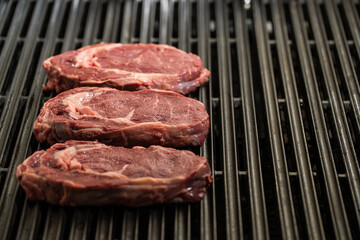 Beef Steak on grill surface 