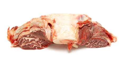 piece of meat on the bone on a white background