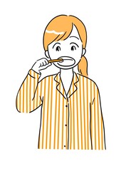 歯磨きをする女性