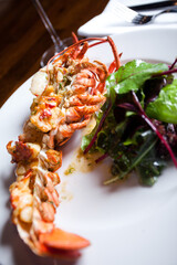 Grilled shrimps and white wine in restaurant