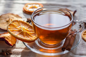 Cup of tea and slices of dried orange