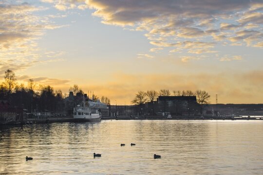 A marina on Lake Storsj&ouml;n in &Ouml;stersund at sunrise in November
