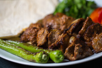 Kebab from beef, chicken and vegetables