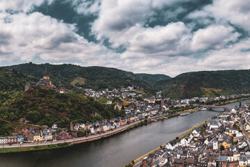 Fototapeta na wymiar Panorama of Cochem with the Reichsburg Cochem, Germany. Drone photography. Created from several images to create a panorama image.