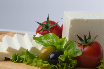 Healthy fresh meal white cheese and tomatoes and olives