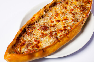 Turkish pizza pide meat and cheese on dough