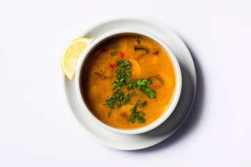 Hot soup in white plate