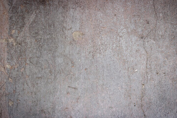 The texture of the old concrete wall for the background. Dark background, empty background. Close up photography.