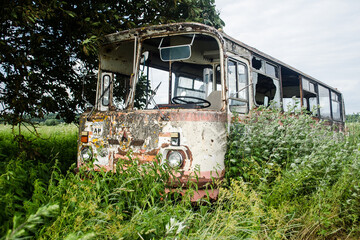 Rusty, old abandoned bus wreck in Latvia