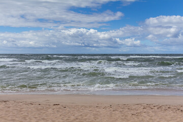 Fototapeta na wymiar Baltic sea at noon with waves.