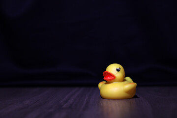 Yellow Rubber Duck on the black background