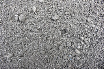 Background of freshly tilled land. Small lumps of clay soil in the vegetable garden. Munilla, La Rioja, Spain.