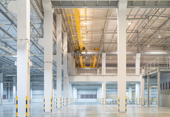Concrete floor inside factory or warehouse building with empty space for industry background....