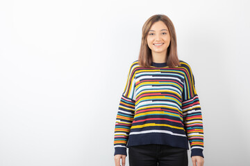 Portrait photo of a young cute woman model standing and posing
