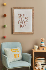 Cozy interior of child room with mint armchair, brown mock up poster frame, toys, teddy bear, plush...