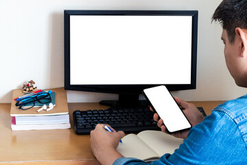 Mockup Copy Space Computer Notebook Laptop Concept , a man's hand using a laptop on internet websites at the office, keyboards on laptop computer with balnk copy screen for your advertising content.
