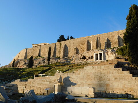 January 2019, Athens, Greece. View of the Acropolis hill south slope. The Parthenon temple, choragic monuments, the theater of Dionysus, the statue of Menander