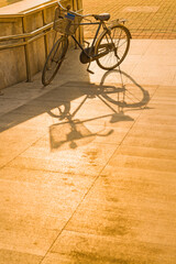 Fototapeta na wymiar Old bicycle with shadow parked